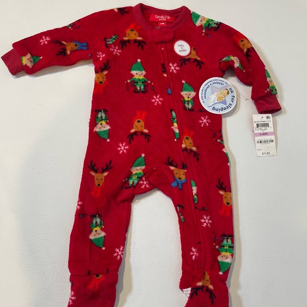 Family PJ’s by Macy’s. 6-9 months. One piece with zipper front and footies. NWT.